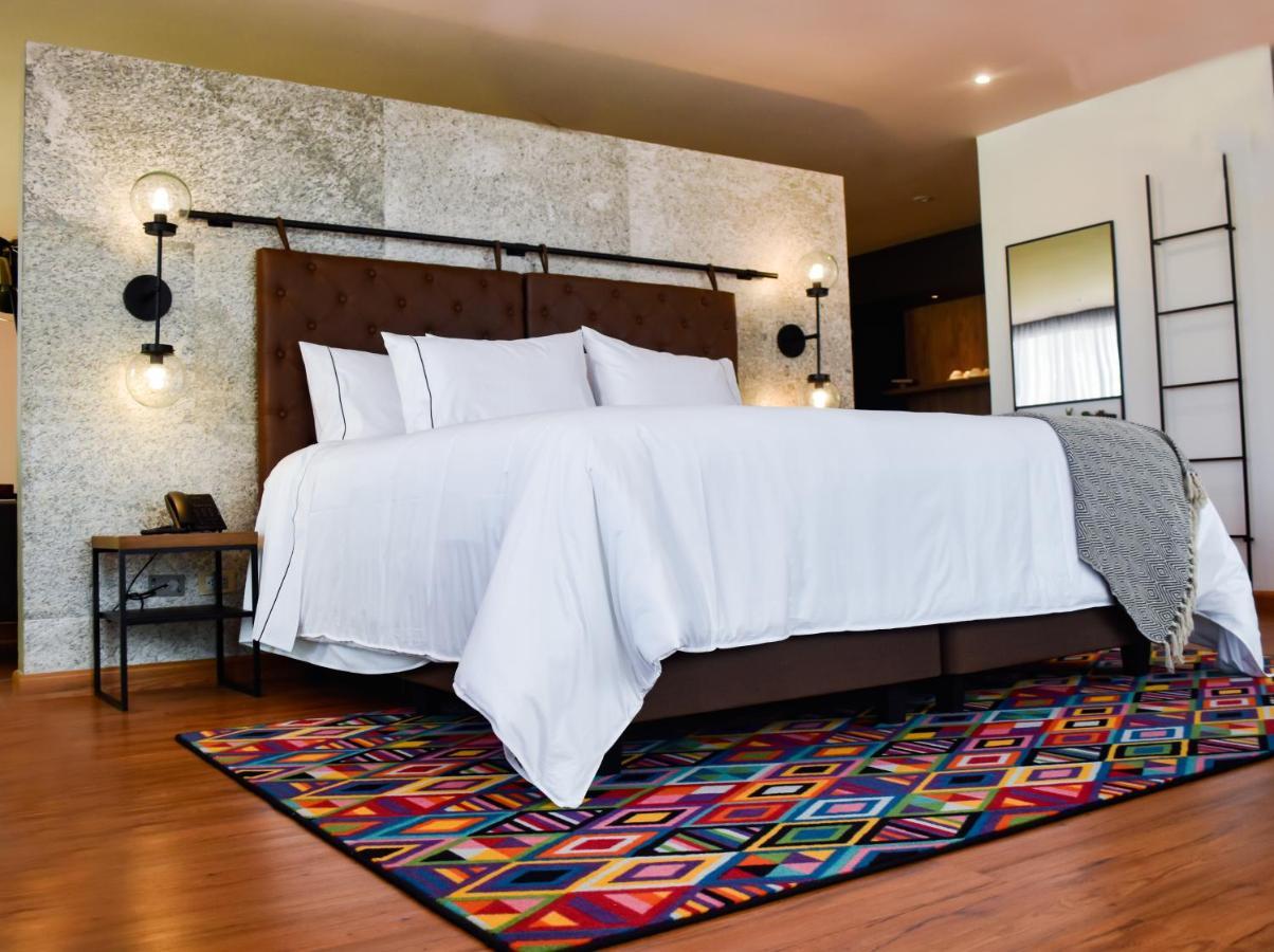 Hotel V1501 Pasto Exterior photo A bedroom with a carpet